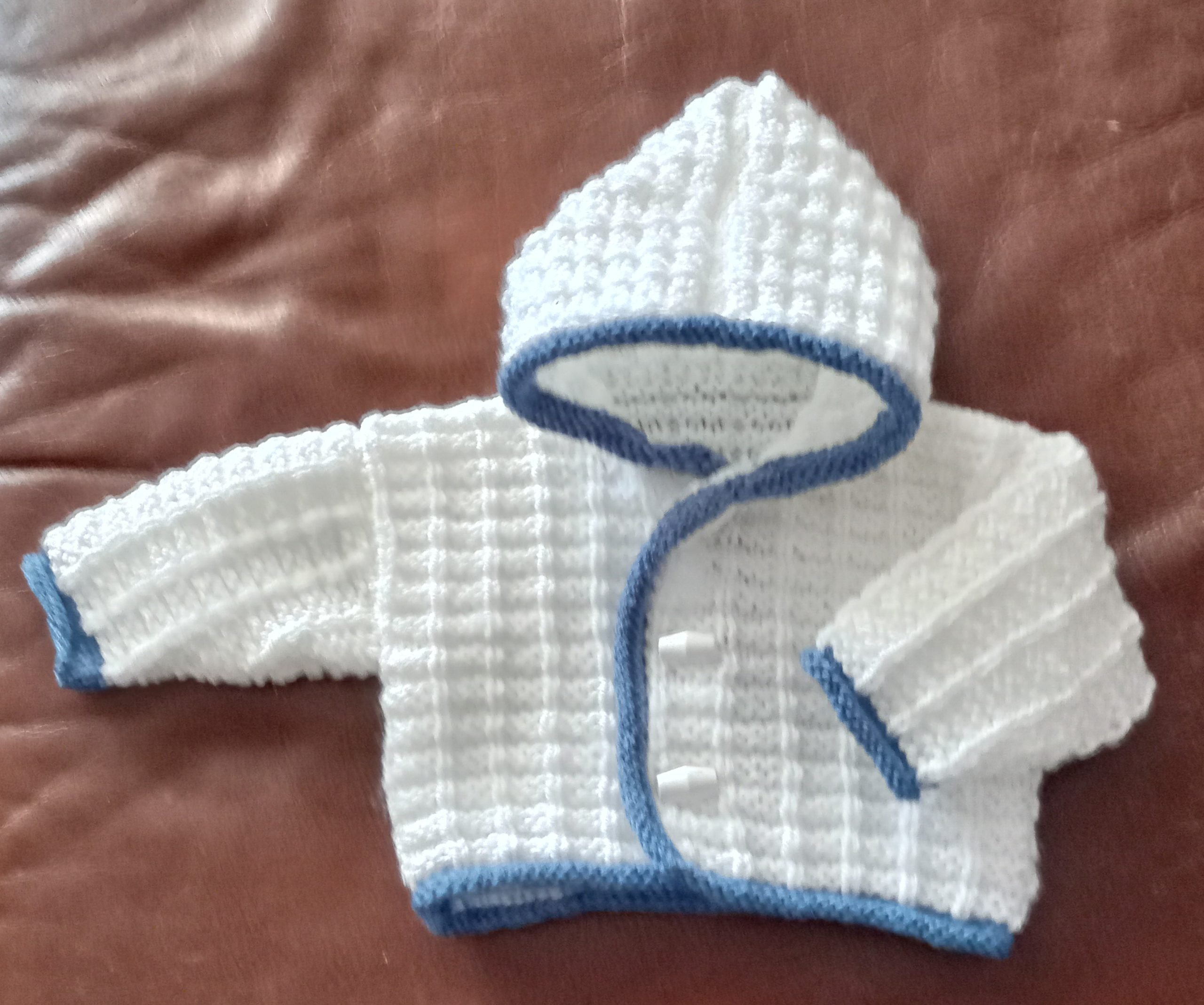 Hand Knitted Baby Hooded Jacket – White with Blue Trim – Small Size
