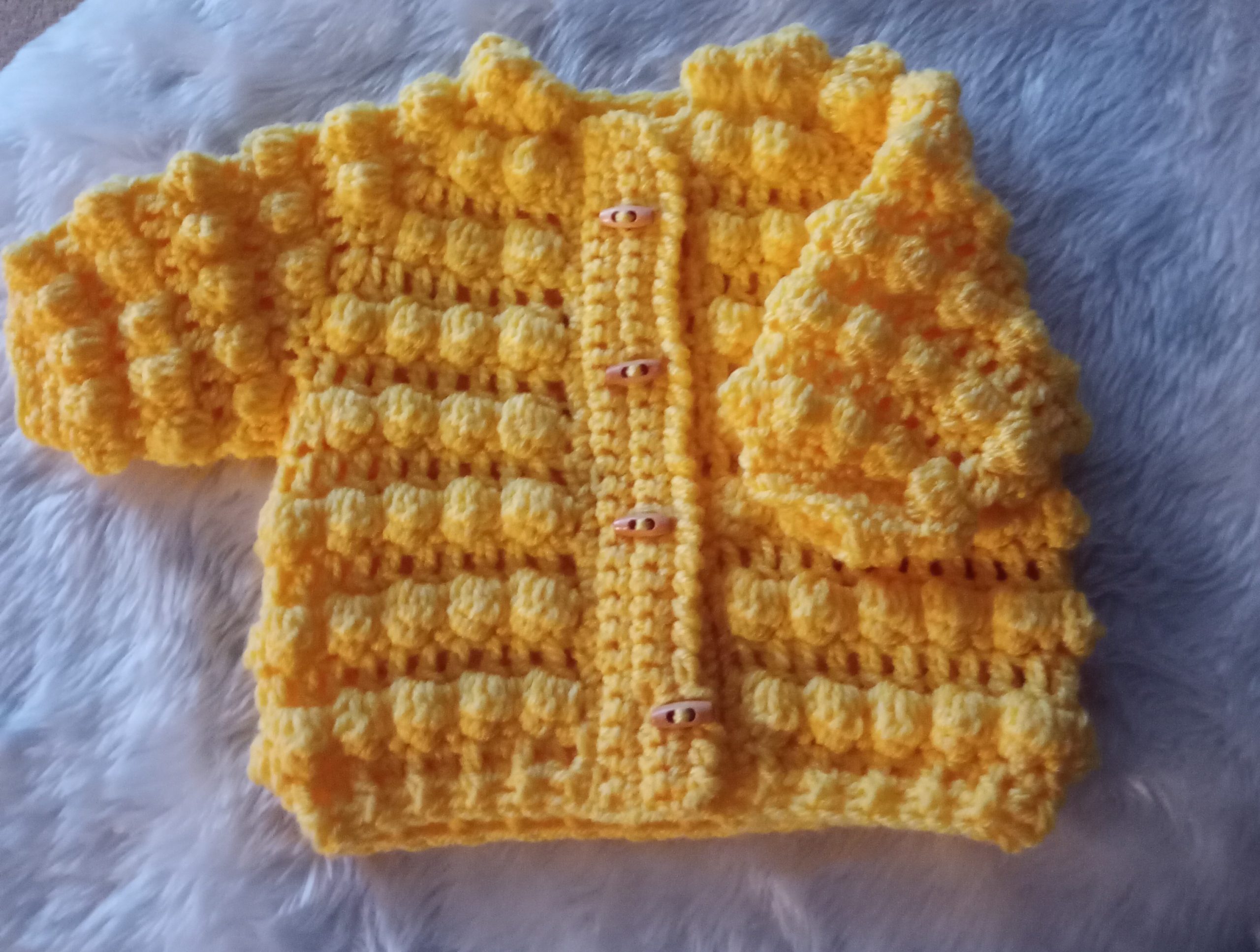 Canary yellow bobble baby jacket